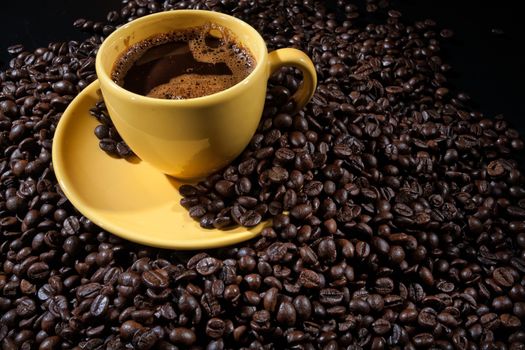 Coffee and coffee beans ona studio background