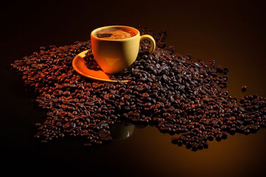 Coffee and coffee beans ona studio background