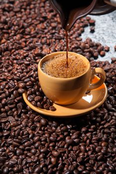 Coffee and coffee beans ona studio background