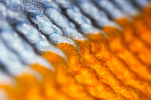 Bright blue and orange braided wool macro close-up