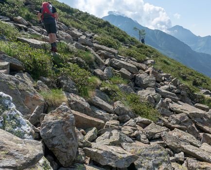 Summer tourism of treks in mountain landscape