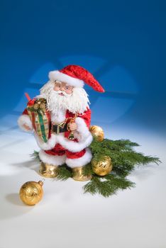 Santa Klaus statuette on a studio background