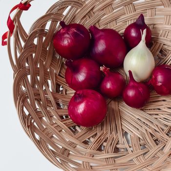 red onion and white onion wicker basket