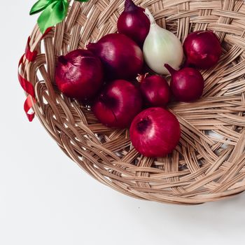 red onion and white onion wicker basket