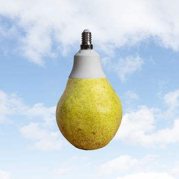A pear with a light bulb attack with a sky in the background