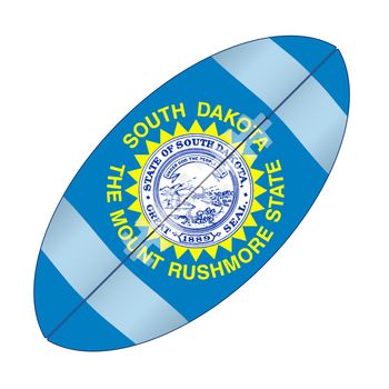 A typical american type foorball over a white background with the flag of South Dakota