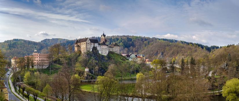 Loket Castle is a 12th-century Gothic style castle about 12 kilometres from Karlovy Vary on a massive rock in the town of Loket, Czech Republic.