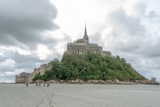 Normandy abbey attraction for vacation tourism in cloudy weather