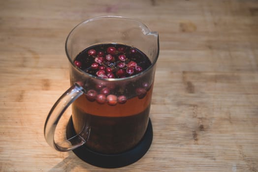 Tea pot with cup berry