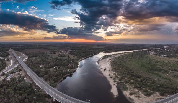 Bridge over the river aerial drone.