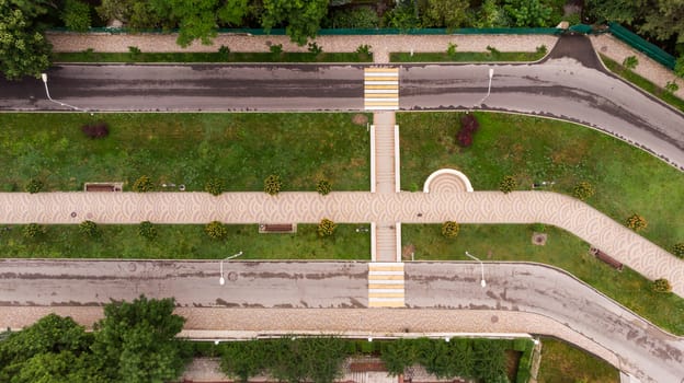 walking trail in the park. shooting from a drone.