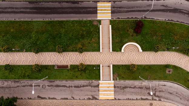 walking trail in the park. shooting from a drone.