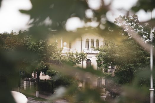 View on house across trees.