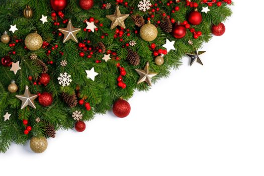 Christmas Border frame of tree branches on white background with copy space isolated, red and golden decor, berries, stars,