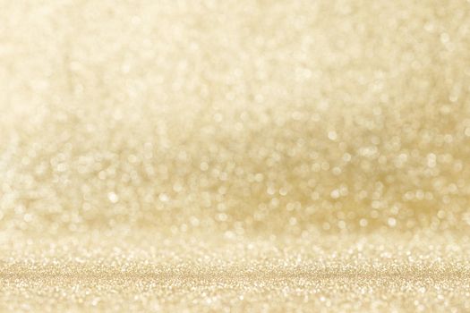 Shiny golden bokeh glitter lights abstract background, Christmas New Year party celebration concept