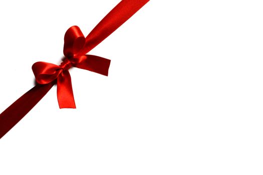 Red gift bow isolated on white background