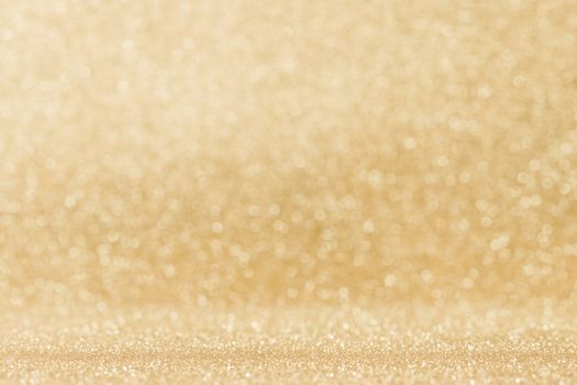 Shiny golden bokeh glitter lights abstract background, Christmas New Year party celebration concept