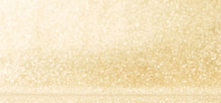 Shiny golden bokeh glitter lights abstract background, Christmas New Year party celebration concept