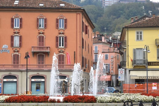 A fountain made with sone iron children in the main square of Mondovi