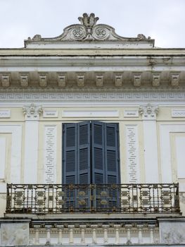 Achilleion palace, Corfu, Greece - August 24, 2018: Balcony at Achilleion palace, Corfu. The Achilleion Palace can be found in the Village of Gastouri, 10 km south west of the town of Corfu.