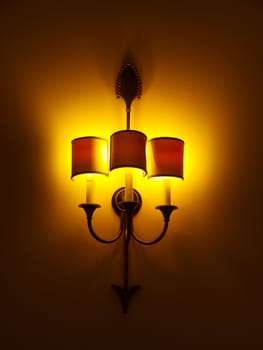 Beautiful retro luxury interior lighting lamp at the wall.