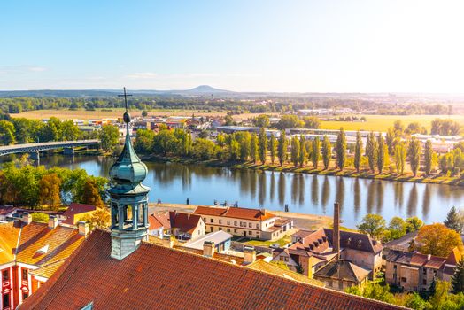 Aerial view of Litomerice and Labe River from cathedral bell tower on sunny summer day, Czech Republic.