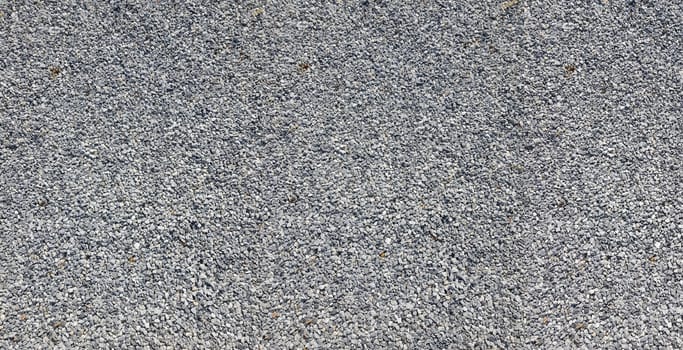 Close-up of a picture with gravel stones, pebbles as a background