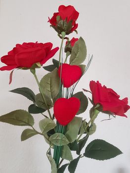 Bouquet of red roses on a clear background. Soft focus. Valentine's day, wedding day or engagement