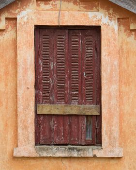 Closed window in a village on Madagascar, Africa