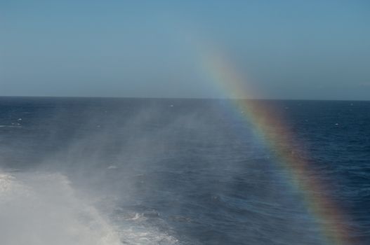 Wake and rainbow left by a ship. Atlantic Ocean. Canary Islands. Spain.
