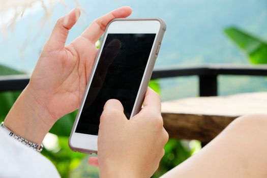 Close up image of Woman Using a Smart Phone