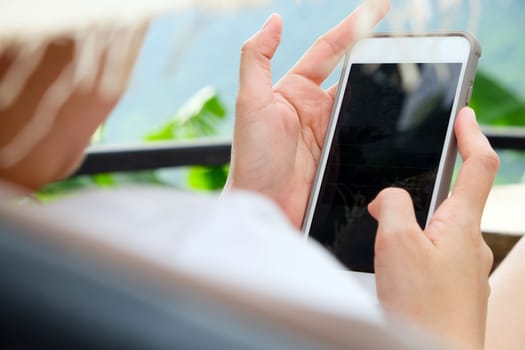 Close up image of Woman Using a Smart Phone