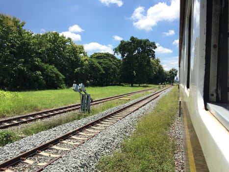 Railway tracks in a rural scene , Thai train travel routes