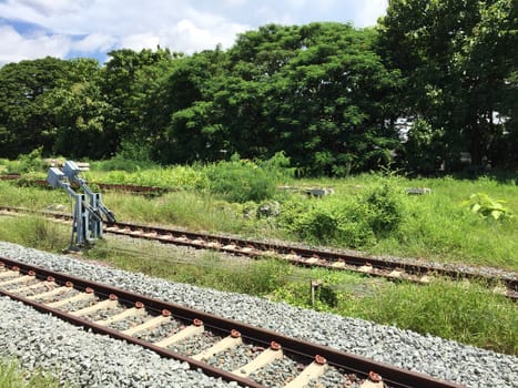 Railway tracks in a rural scene , Thai train travel routes