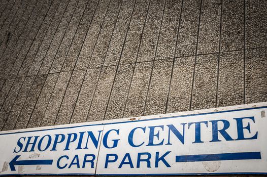 Grim British Inner City Shopping Centre Sign With Copy Space