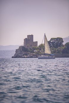 Solanto Castle from the sea with sailboat