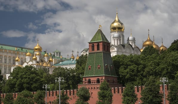 Moscow Russia View on Complex of Churches in Moscow Kremlin, on against cloudy sky.