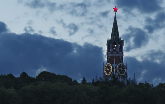 Moscow Russia, View on Spaskaya tower of the Moscow Kremlin at Night on against cloudy sky.