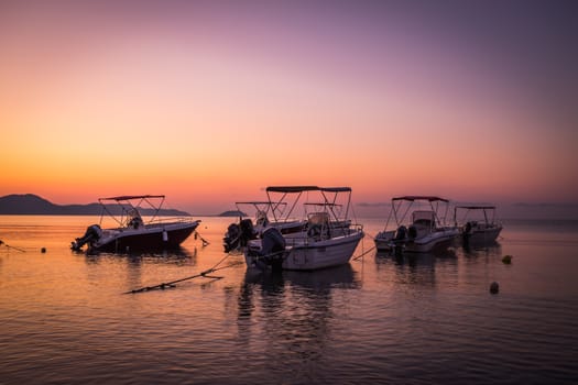 Beautiful sunrise in the little harbor on the island of Zakynthos, Greece. Agios sostis.