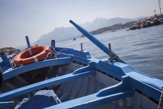 Detail of a blue rowing boat in Porto Bagnera in Sicily