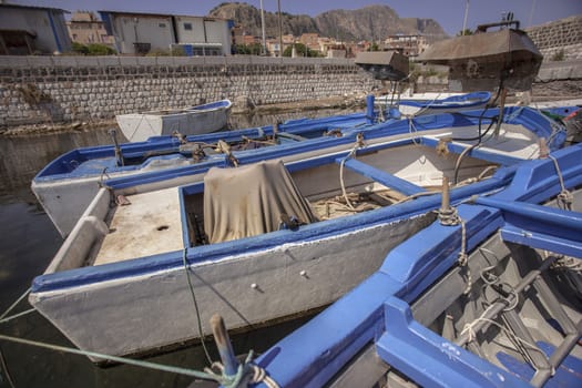 Moored wooden boats in Bagnera Port, Sicily