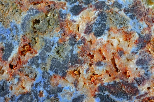 Multicolor surface of mineral stone, textured background 