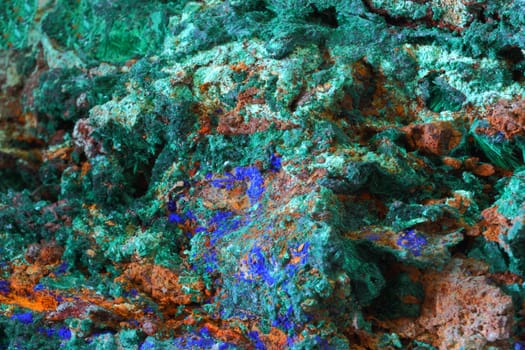 Multicolor surface of mineral stone, textured background 