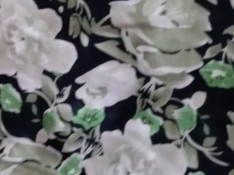 rose textile design on black background