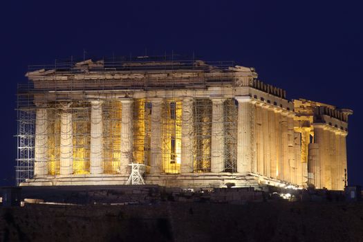 Athens, Greece - July 20, 2019: The Acropolis of Athens Unesco heritage with the Parthenon illuminated at night