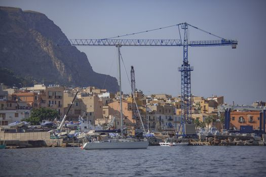 Cranes in Banghera Port at sunset