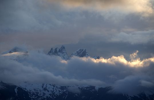 View of Snow Mountain Range Landscape with Blue Sky. Russia, Caucasus.