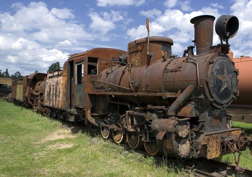 Old rusty steam locomotive in open air museum of Pereslavl, Russia