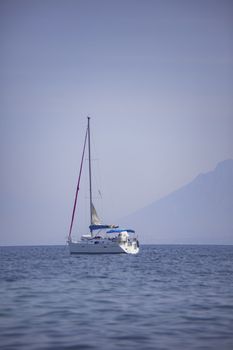 Sailboat navigate in sicily during summer period