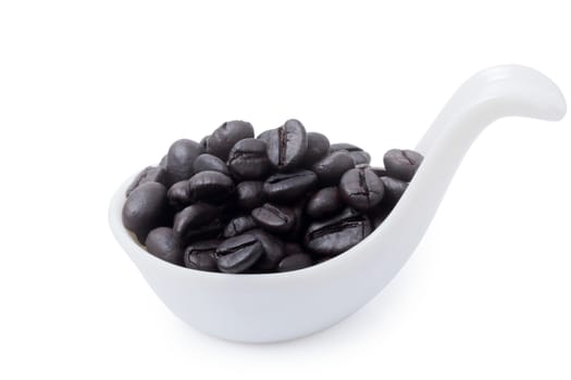 Isolated of coffee beans in ceramic spoon over white background, clipping path.